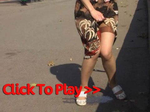 Skirt And Panty Peeing In The Street
